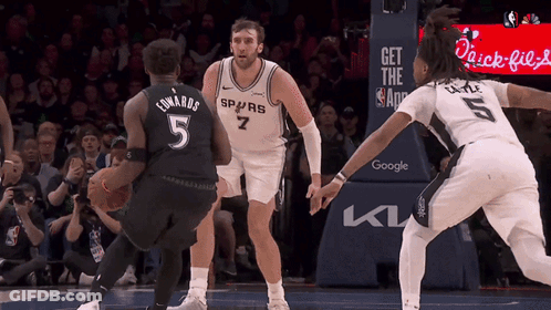 Basketball Player In Number 5 Jersey Dribbling GIF