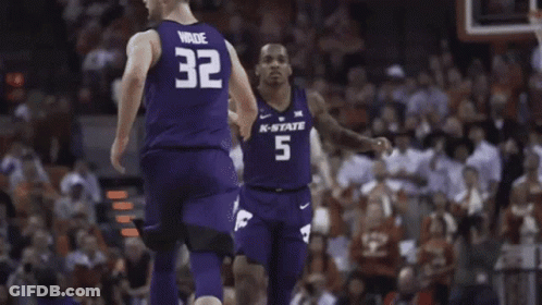 Basketball Player In Number 5 Jersey In Front Of Muscle Milk Sign GIF