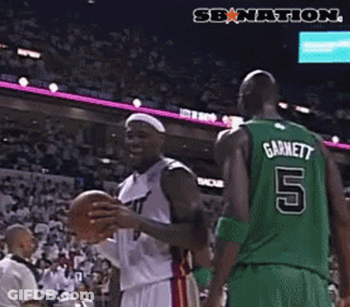 Basketball Player In Number 5 Jersey Next To Another GIF