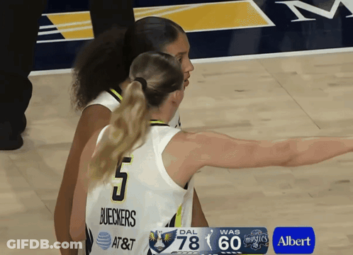 Basketball Player In Number 5 Jersey Talking To Another Player GIF