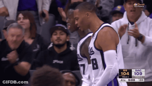 Basketball Player In Number 8 Jersey In Front Of Crowd GIF