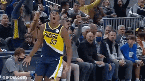 Basketball Player In Pacers Jersey Jumping In Front Of Crowd GIF