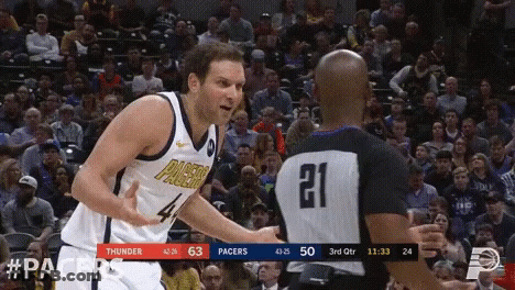 Basketball Player In Pacers Uniform Talking To Referee GIF