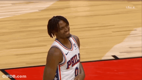 Basketball Player In Philadelphia Jersey Holding Ball GIF
