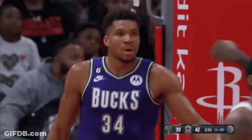 Basketball Player In Purple Bucks Jersey GIF