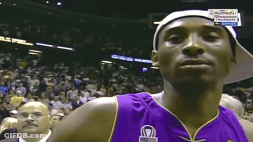 Basketball Player In Purple Jersey And White Hat GIF