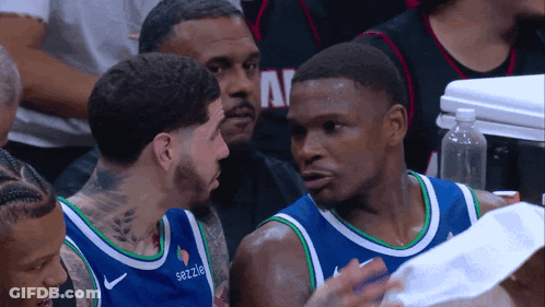 Basketball Player In Sezzle Shirt Talking To Another Player GIF