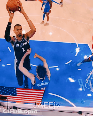 Basketball Player In Spurs Jersey Jumping GIF