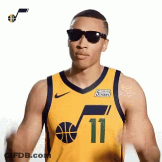Basketball Player In Sunglasses And Yellow Jersey Number 11 GIF