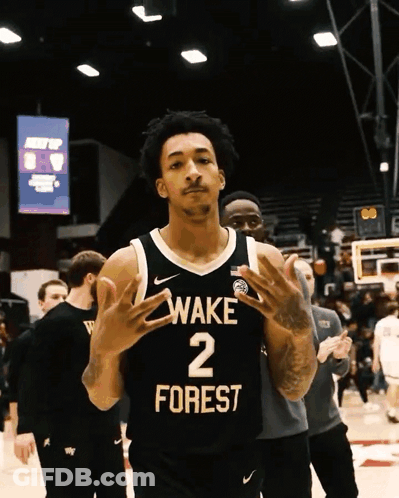 Basketball Player In Wake Forest Jersey On Court GIF