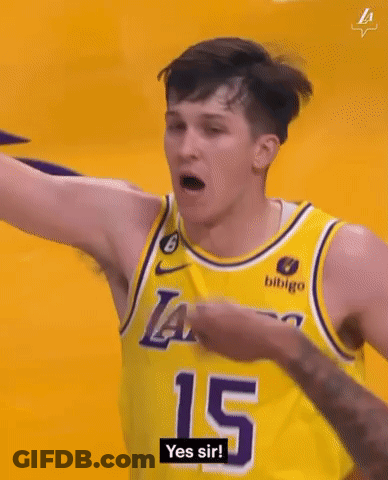 Basketball Player In Yellow Jersey Fist Bump GIF