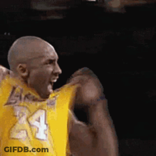 Basketball Player In Yellow Jersey Fist Pump GIF