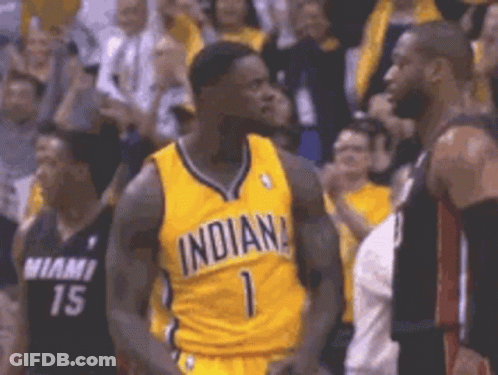 Basketball Player In Yellow Jersey Number 1 Next To Black Player GIF
