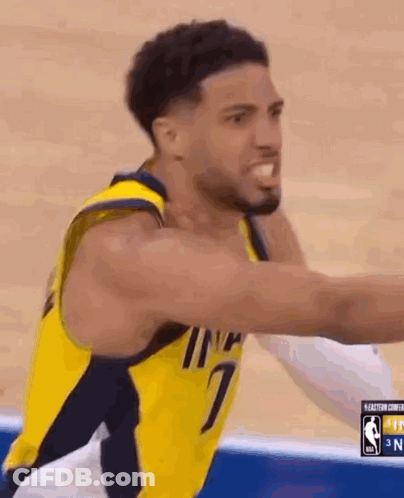 Basketball Player In Yellow Jersey Reaching GIF