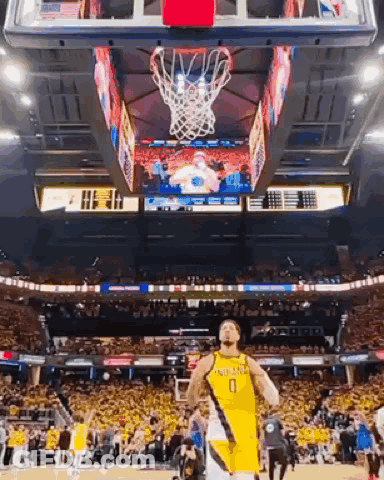 Basketball Player In Yellow Jersey GIF