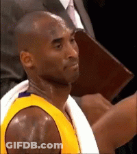 Basketball Player In Yellow Jersey With White Towel GIF
