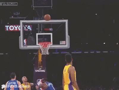 Basketball Player In Yellow Lakers Jersey Jumping GIF