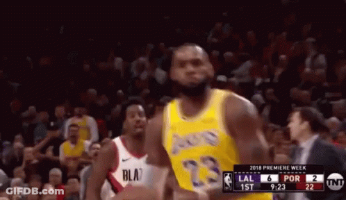 Basketball Player In Yellow Lakers Jersey With Crowd GIF