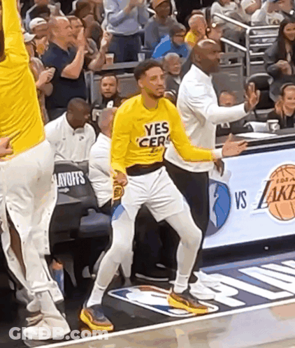 Basketball Player In Yellow Yes Cera Shirt GIF