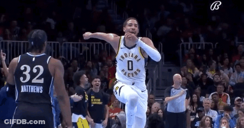 Basketball Player Jumping During Game GIF