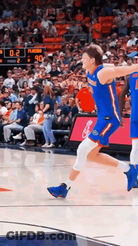 Basketball Player Jumping During Game With Watcher GIF