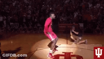 Basketball Player Jumping In Air On Court GIF