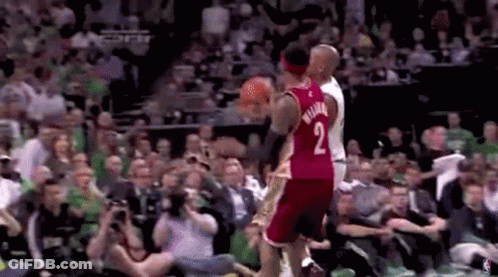 Basketball Player Jumping Over Another GIF