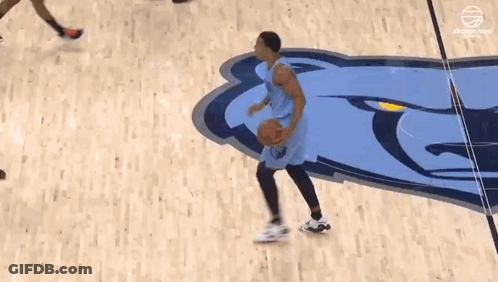 Basketball Player Jumping To Catch Ball GIF