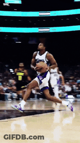 Basketball Player Jumping With Ball GIF