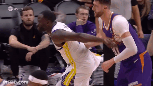 Basketball Player Kicking Another GIF