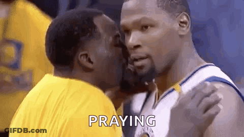 Basketball Player Kissing Another Player On Cheek GIF
