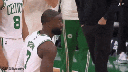 Basketball Player Kneeling In Celtics Jersey GIF