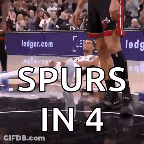 Basketball Player Laying On Floor Spurs In 4 GIF
