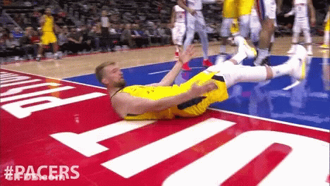 Basketball Player Laying On Floor With Pacers GIF
