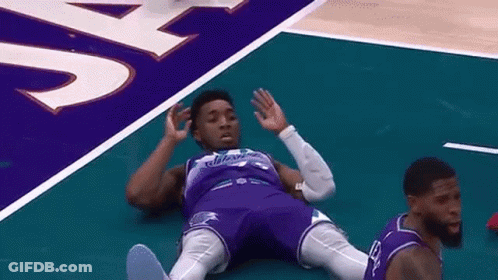 Basketball Player Lying On Floor GIF