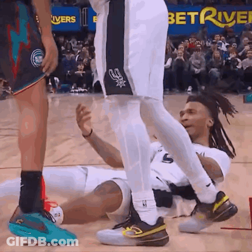 Basketball Player Lying On Floor GIF