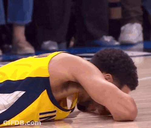 Basketball Player Lying On Floor GIF