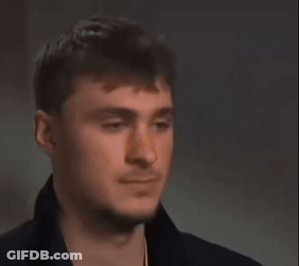 Basketball Player Lying On Floor With Arms Up GIF