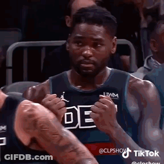 Basketball Player Making Funny Face In Stands GIF