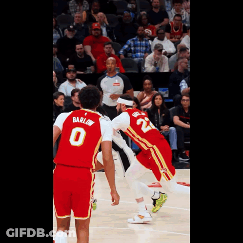 Basketball Player Number 0 Next To Player 22 GIF