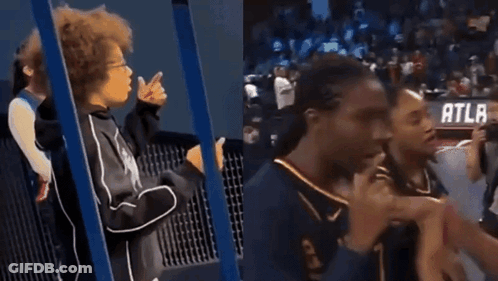 Basketball Player Number 1 Talking To Woman GIF