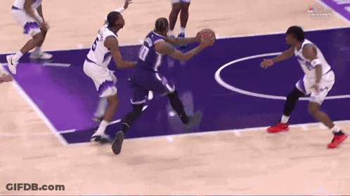 Basketball Player Number 10 Dribbling GIF