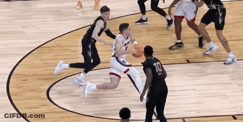 Basketball Player Number 10 Dribbling GIF