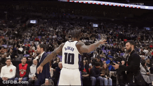 Basketball Player Number 10 In Front Of Crowd GIF