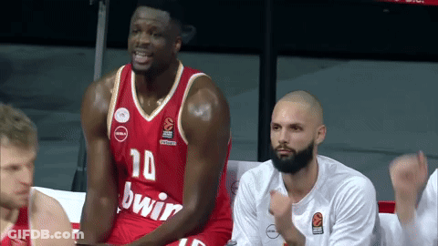 Basketball Player Number 10 Jersey Sitting On Bench GIF