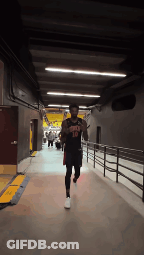 Basketball Player Number 10 Running Down Hallway GIF