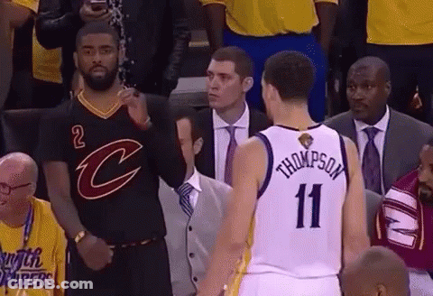 Basketball Player Number 11 Standing Next To Another Player GIF