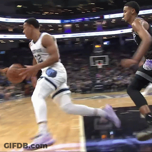 Basketball Player Number 12 Dribbling GIF