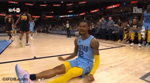 Basketball Player Number 12 Sitting GIF