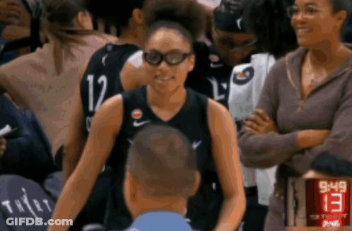 Basketball Player Number 12 Talking To Man GIF